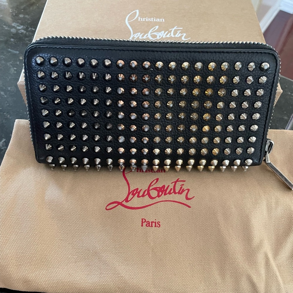 CHRISTIAN LOUBOUTIN  Studded Black Wallet with classic Red Zipper Pull